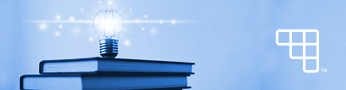 lightbulb on top of stack of books with blue color overlay