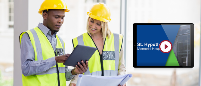 two constructors view plans during a project